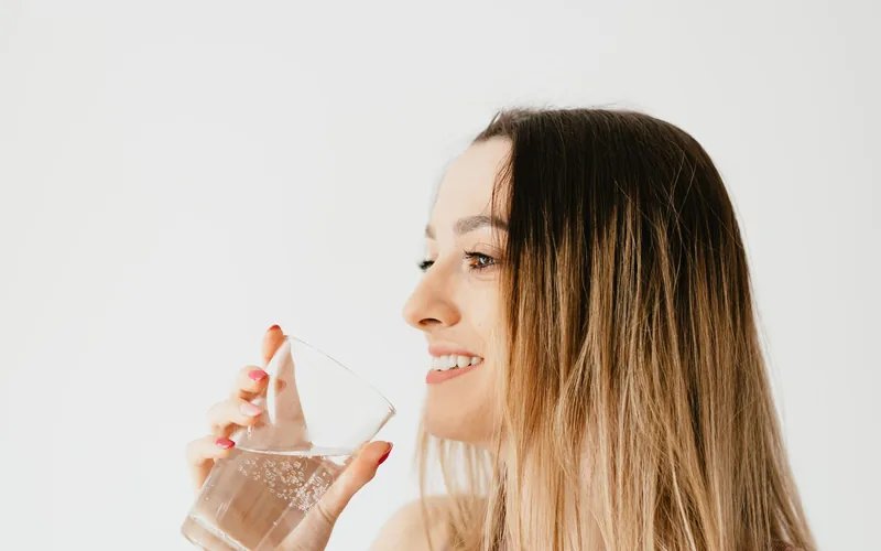 Woman drinking a glass of water